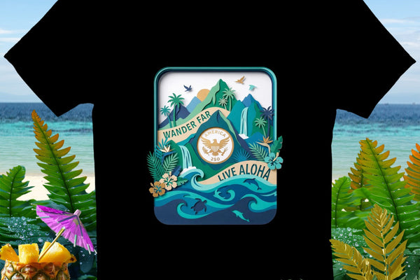 Black t-shirt featuring a tropical scene with mountains, waterfalls, and text "WANDER FAR LIVE ALOHA".