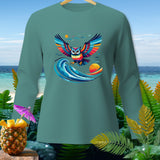 Teal long-sleeve shirt featuring a colorful owl flying over a wave.