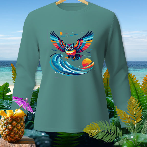 Teal long-sleeve shirt featuring a colorful owl flying over a wave.