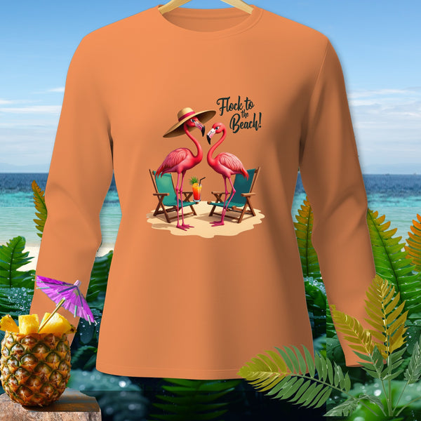Orange long-sleeve shirt with cartoon flamingos, beach chairs, and "Flock to the Beach!" text.