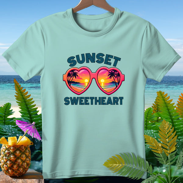 Light blue t-shirt with "SUNSET SWEETHEART" and heart-shaped sunglasses graphic.