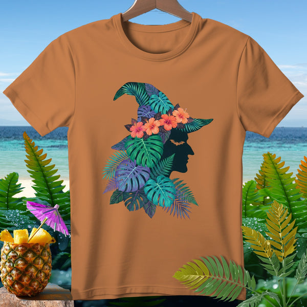 Orange t-shirt with tropical witch hat graphic and pineapple drink.