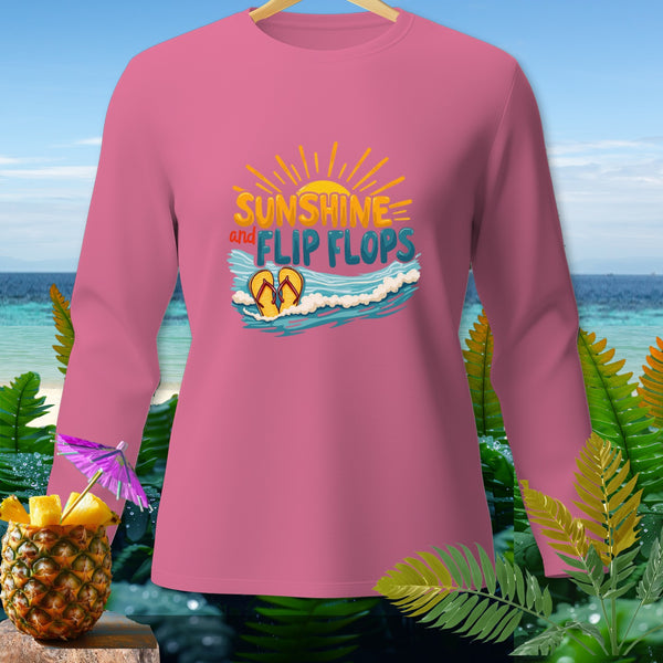 Pink long-sleeve shirt with "Sunshine and Flip Flops" graphic and beach scene.