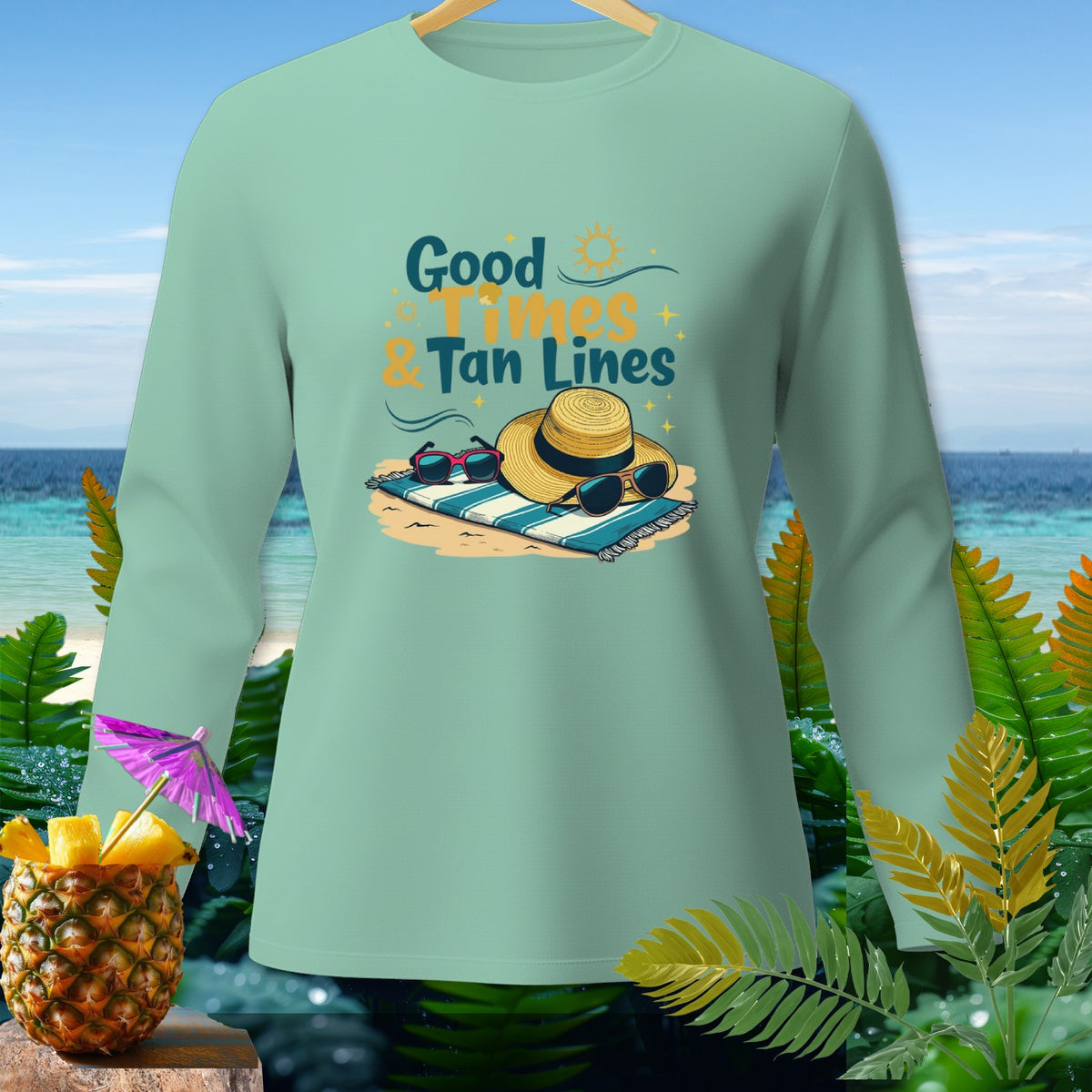 Light green long-sleeve shirt with "Good Times & Tan Lines" graphic.