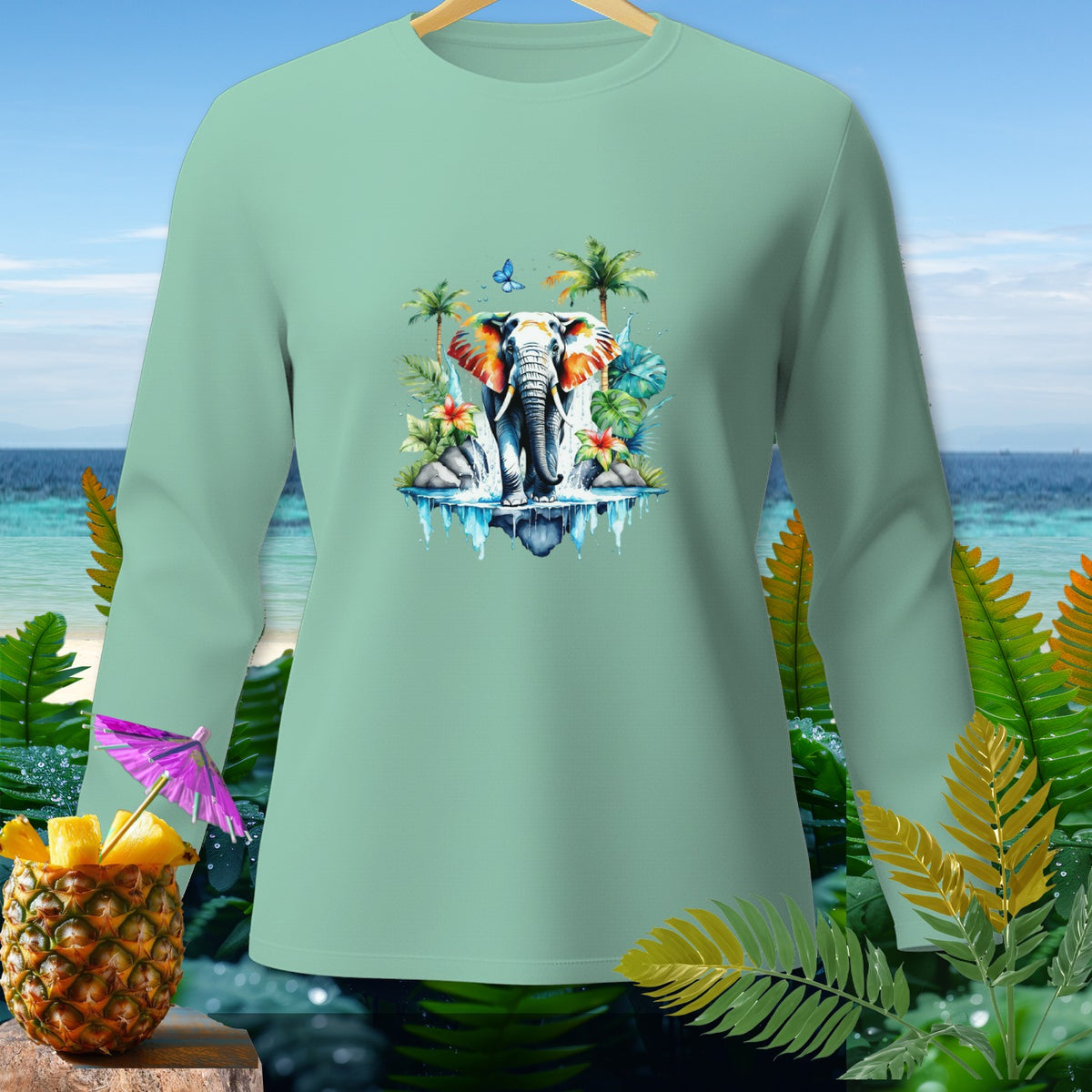Mint long-sleeve t-shirt with an elephant and tropical scene graphic.