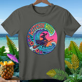 Dark grey t-shirt with a circular graphic of a witch flying on a broomstick over a wave.