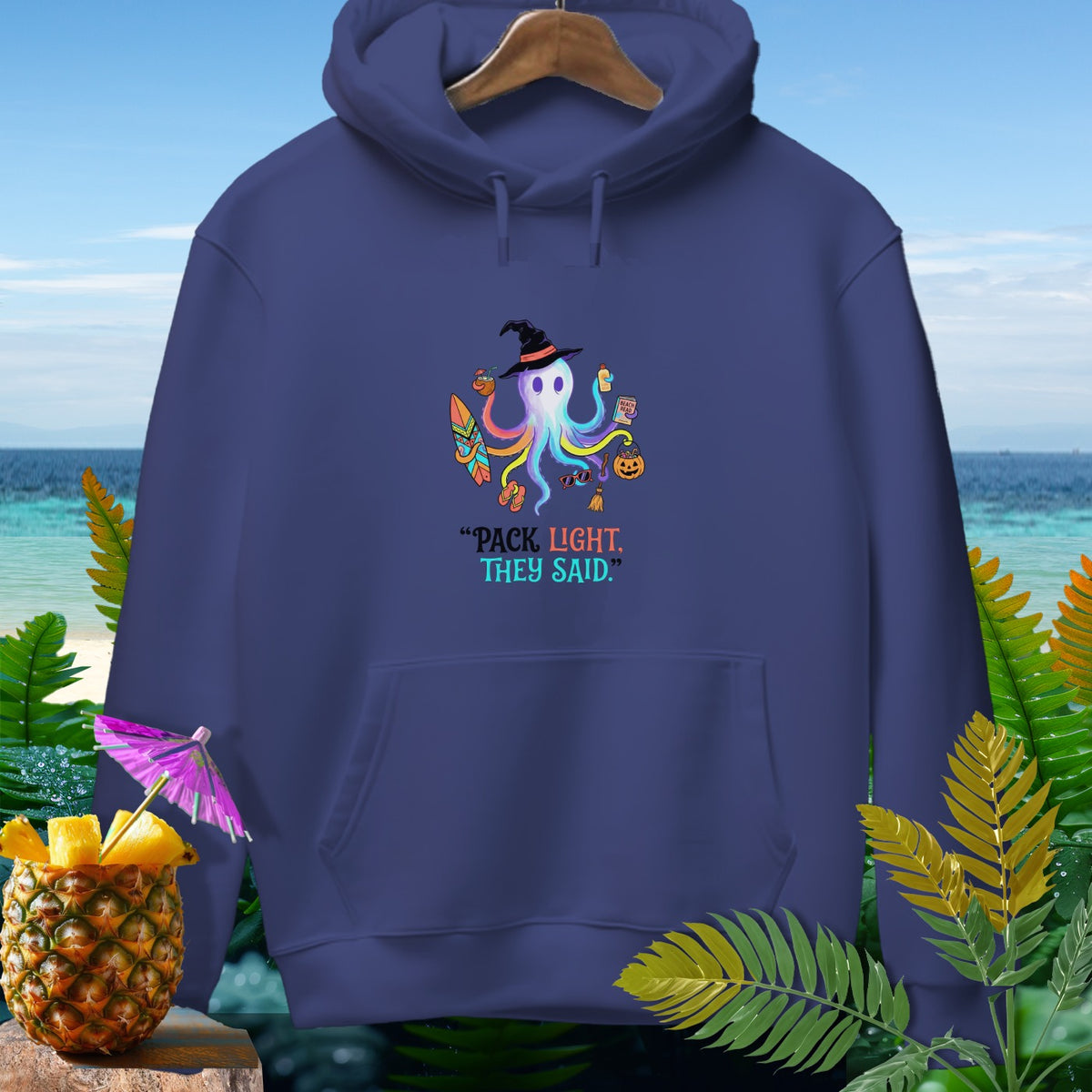 Navy hoodie with an octopus graphic and the text "PACK LIGHT, THEY SAID."