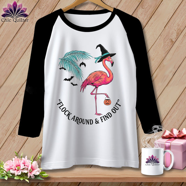 Black and white raglan t-shirt with Halloween flamingo graphic and text.