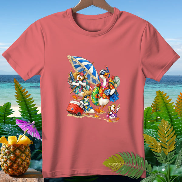 T-shirt with cartoon ducks in Hawaiian shirts on a beach with a cooler and umbrella.