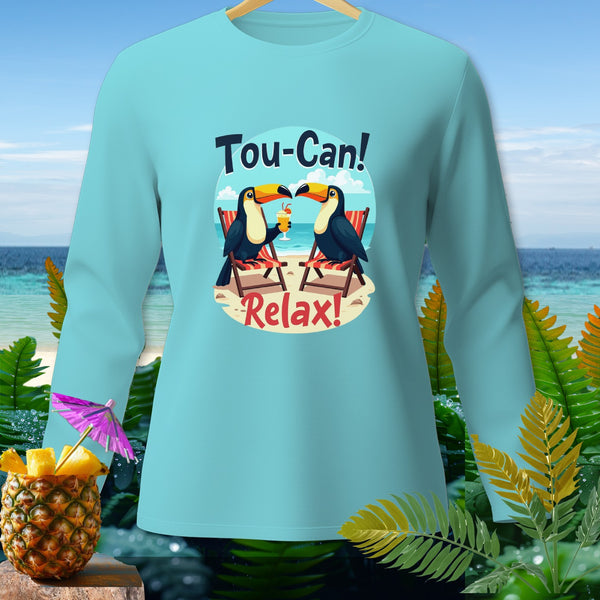 Light blue long-sleeve shirt with toucans, beach scene, and "Tou-Can! Relax!" text.