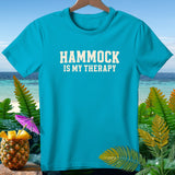 Turquoise t-shirt with white text reading 