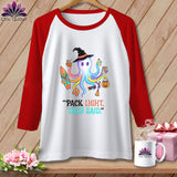 White raglan t-shirt with colorful octopus wearing a witch hat and holding beach items.