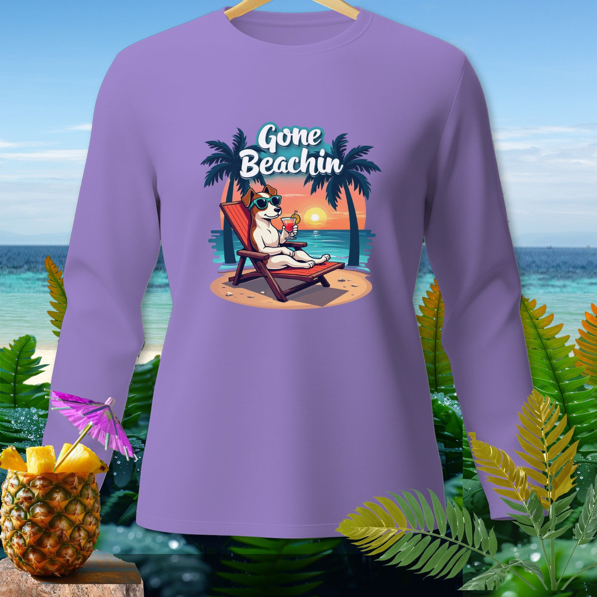 Purple long sleeve shirt with "Gone Beachin" graphic of dog on beach.