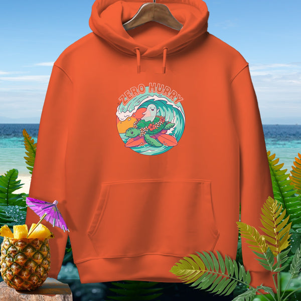 Orange hoodie with "Zero Hurry" text and cartoon turtle surfing with a ghost.