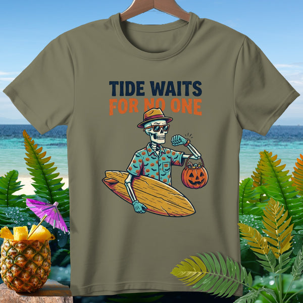 T-shirt graphic: Skeleton with surfboard and pumpkin candy bucket, "Tide Waits For No One" text.