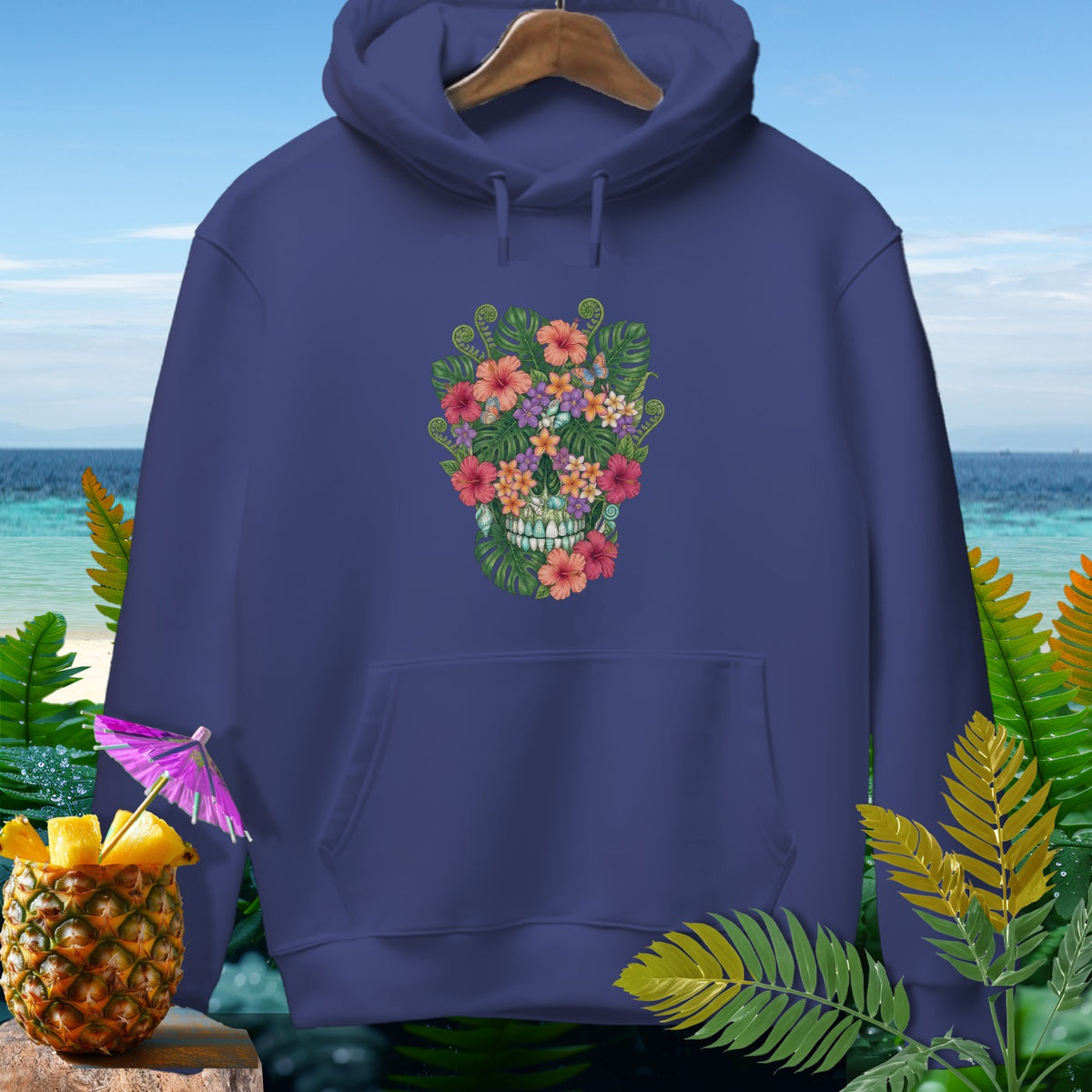 Navy hoodie with a floral skull graphic, tropical foliage, and pineapple garnish.