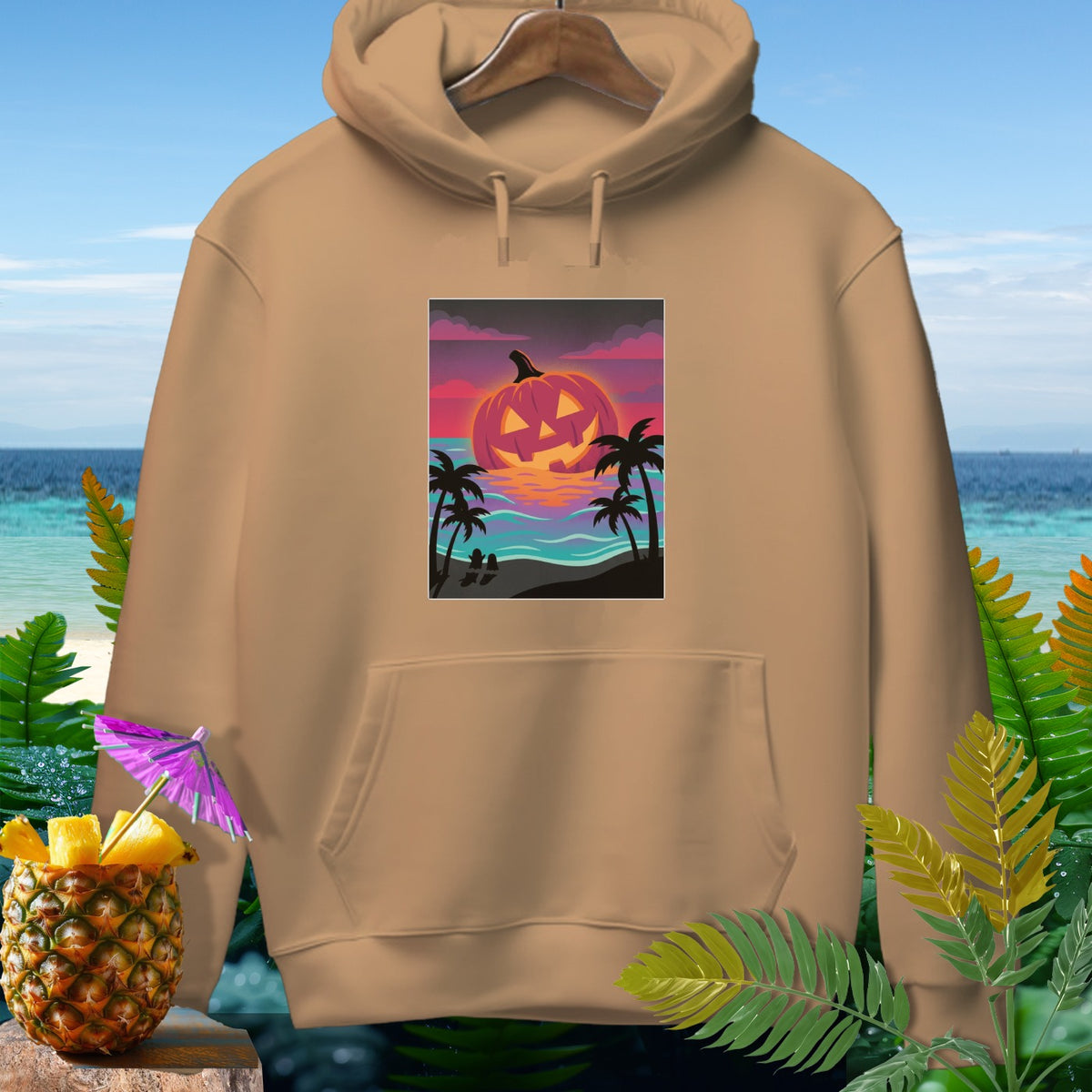 Tan hoodie with a Halloween jack-o'-lantern sunset graphic on the chest.
