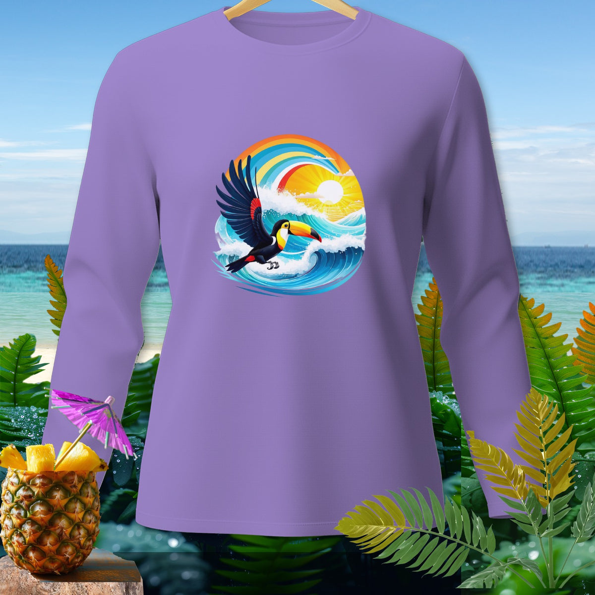 Purple long-sleeve shirt with a toucan flying over a wave, sun, and rainbow graphic.