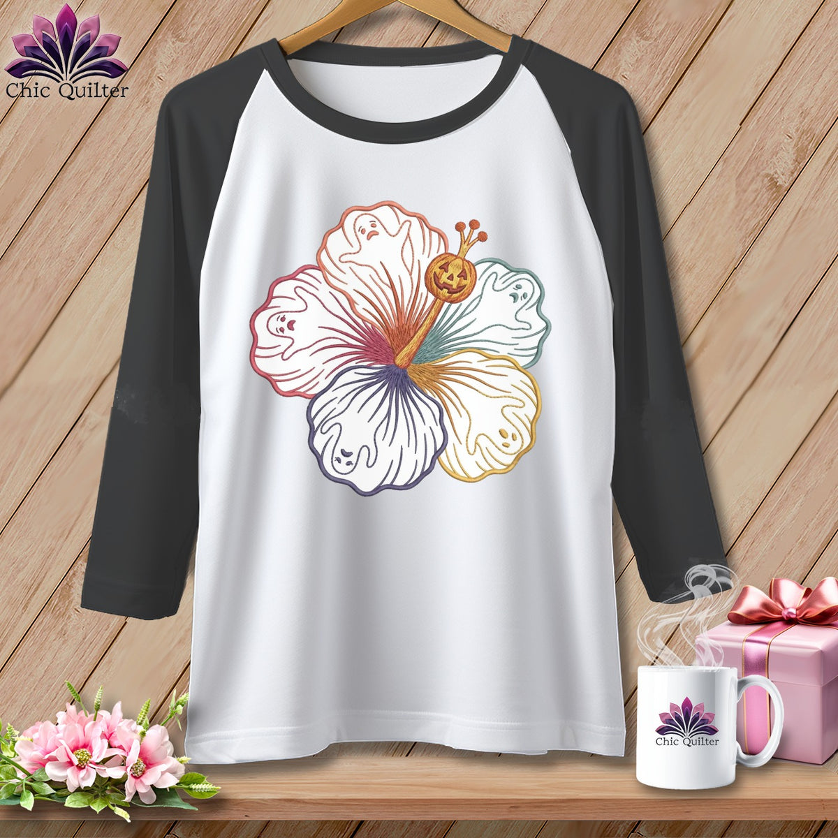 Baseball t-shirt with ghost hibiscus and jack-o'-lantern design.