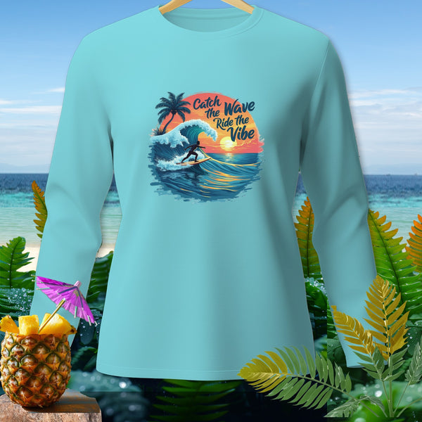 Light blue long-sleeve shirt with "Catch the Wave Ride the Vibe" surf graphic.