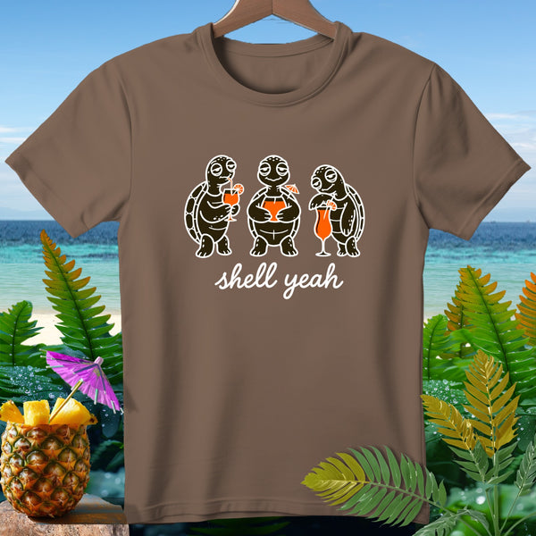 Brown t-shirt with cartoon turtles holding drinks and the text "shell yeah".