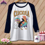 Baseball tee with a "Cluckula" rooster and ghosts design.