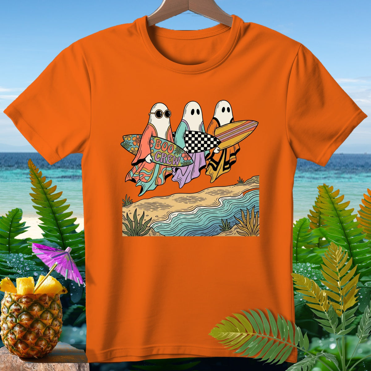 Three cartoon ghosts in flowy robes and sunglasses carry surfboards, one with "BOO CREW" text.