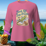 Pink long-sleeve shirt with iguanas on a beach and 