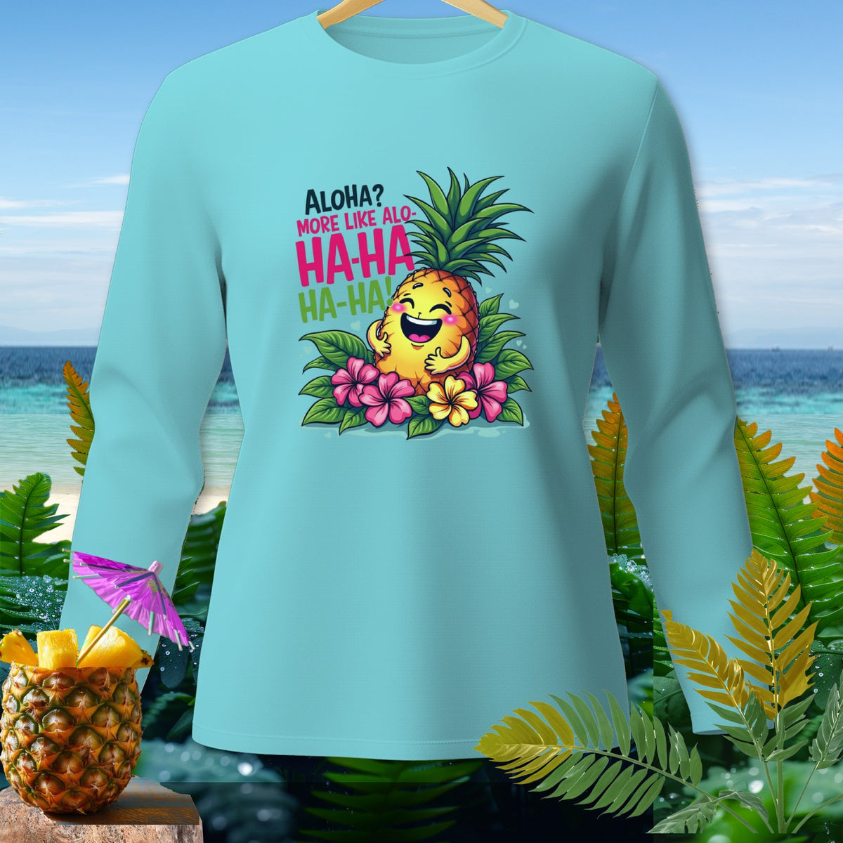 Aqua long-sleeve shirt with a laughing pineapple graphic and text.