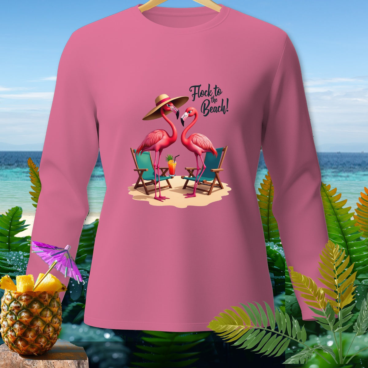 Pink long-sleeve shirt with two flamingos and "Flock to the Beach!" text.
