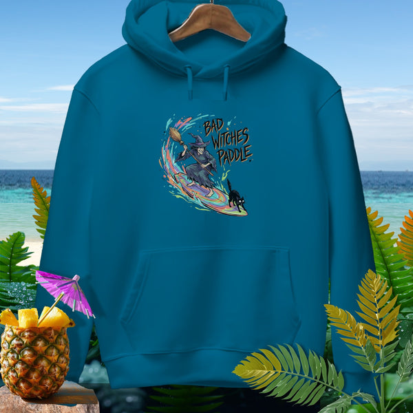 Teal hoodie with "Bad Witches Paddle" graphic of witch, cat, and surfboard.