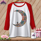White t-shirt with red sleeves and a floral moon design with a surfer.