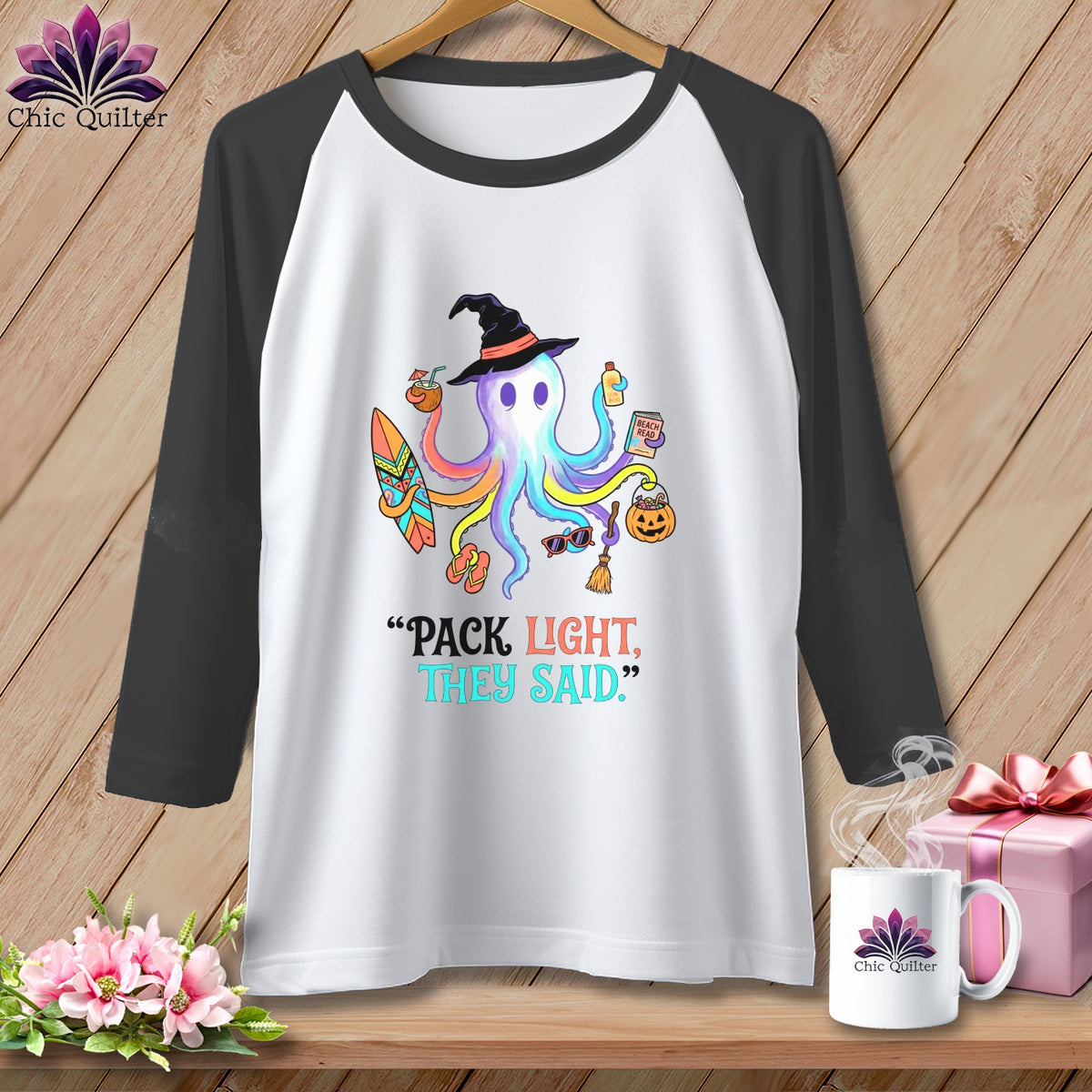 Colorful octopus in witch hat with surfboard, sunglasses, and beach items, saying "Pack Light, They Said."