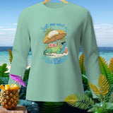 Mint green long-sleeve shirt with iguana, umbrella, and 