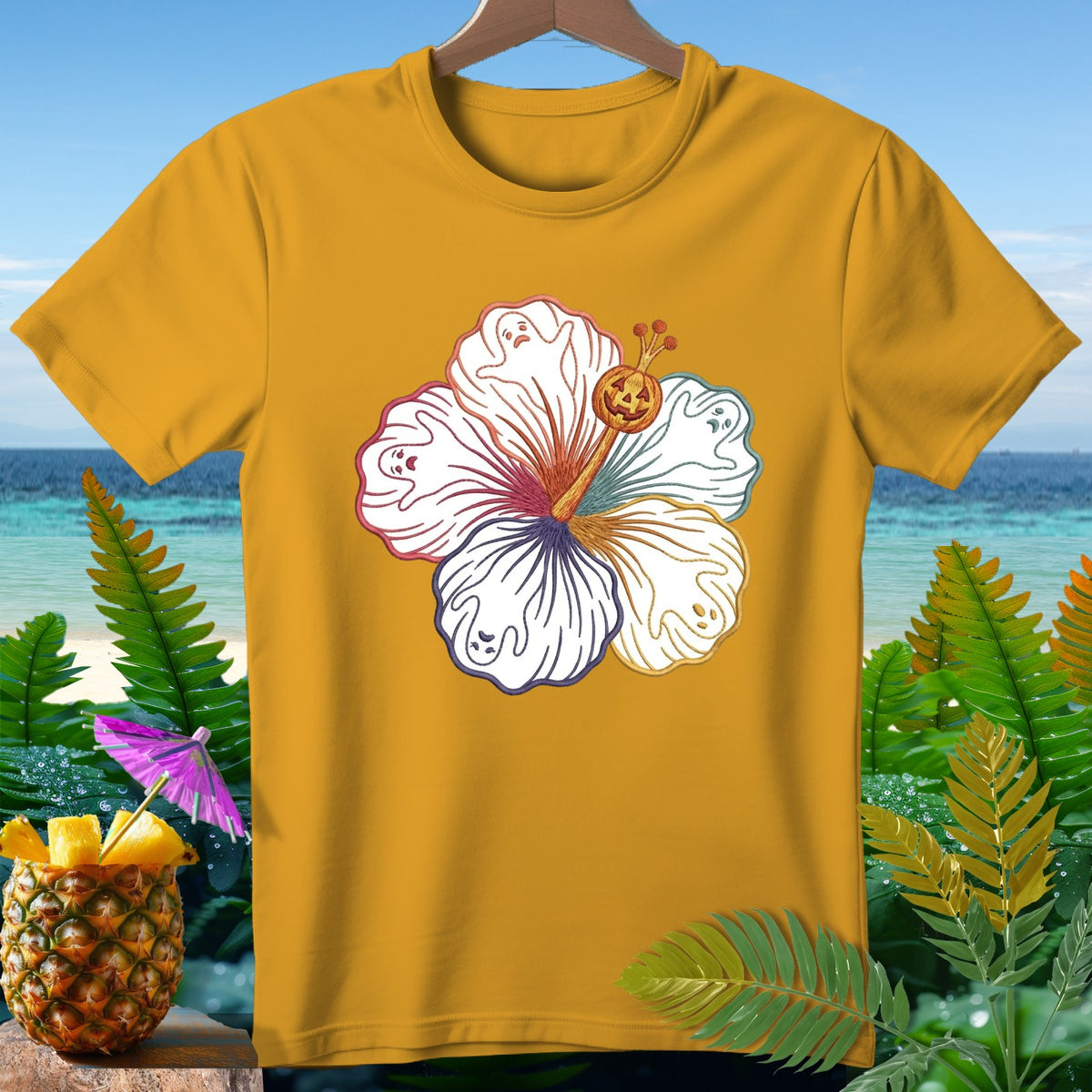 Yellow t-shirt with hibiscus flower design featuring ghosts and a jack-o'-lantern.