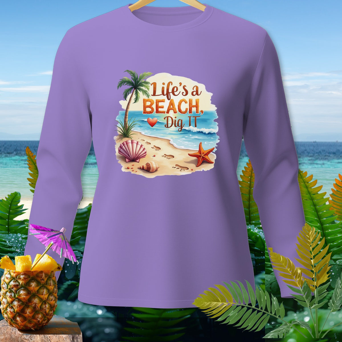 Purple long-sleeve shirt with "Life's a Beach, Dig It" beach graphic.