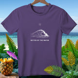 Purple t-shirt with white wave graphic and text 