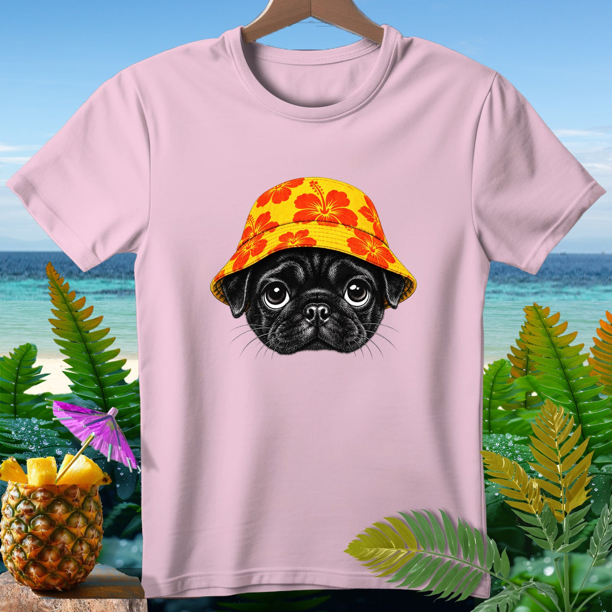 Pink t-shirt with a black pug wearing a yellow hibiscus bucket hat.