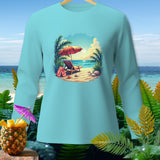 Long-sleeve shirt with a beach scene featuring a lounge chair, umbrella, and ocean.