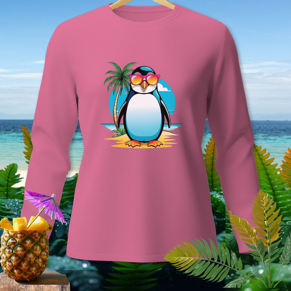 Pink long-sleeve shirt with a cartoon penguin wearing sunglasses on a beach.