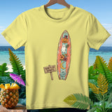 Yellow t-shirt with a surfboard graphic featuring a pumpkin, ghost, moon, and flowers.