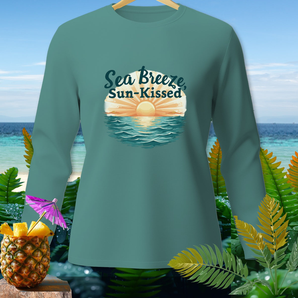 Teal long-sleeve shirt with "Sea Breeze Sun-Kissed" graphic and tropical accents.