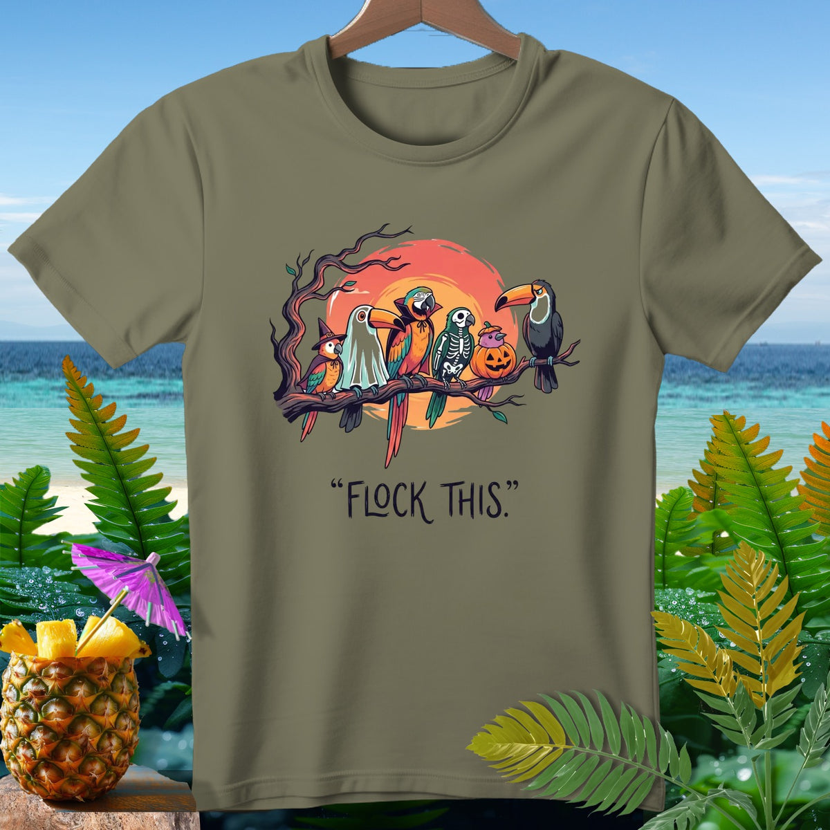 Parrots dressed for Halloween sit on a branch with text "FLOCK THIS."
