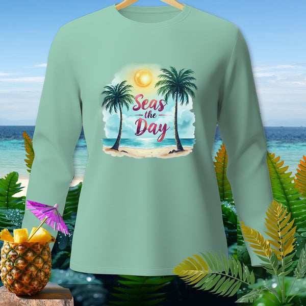Light green long-sleeve shirt with "Seas the Day" beach graphic and tropical accents.
