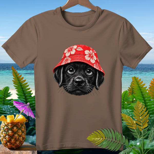 Brown t-shirt with a black puppy wearing a red hibiscus-patterned bucket hat.