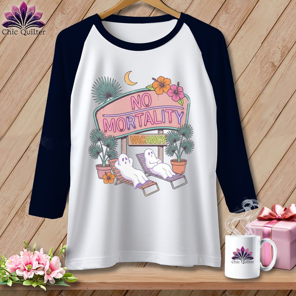 White baseball tee with graphic of ghosts on lounge chairs and "No Mortality Vacancy" sign.
