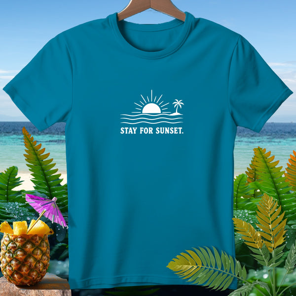 Teal t-shirt with white sunset, waves, palm tree, and "Stay For Sunset" text.