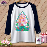 White raglan t-shirt with a colorful volcano and ghost design.
