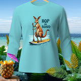 Light blue long sleeve shirt with kangaroo on paddleboard graphic and text 