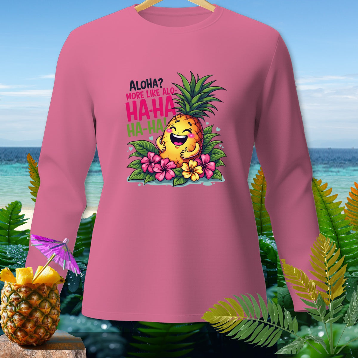 Pink long-sleeve shirt with cartoon pineapple saying "Aloha? More like Alo-HA-HA-HA!"